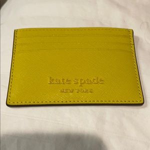 Kate spade “mustard” pocket wallet